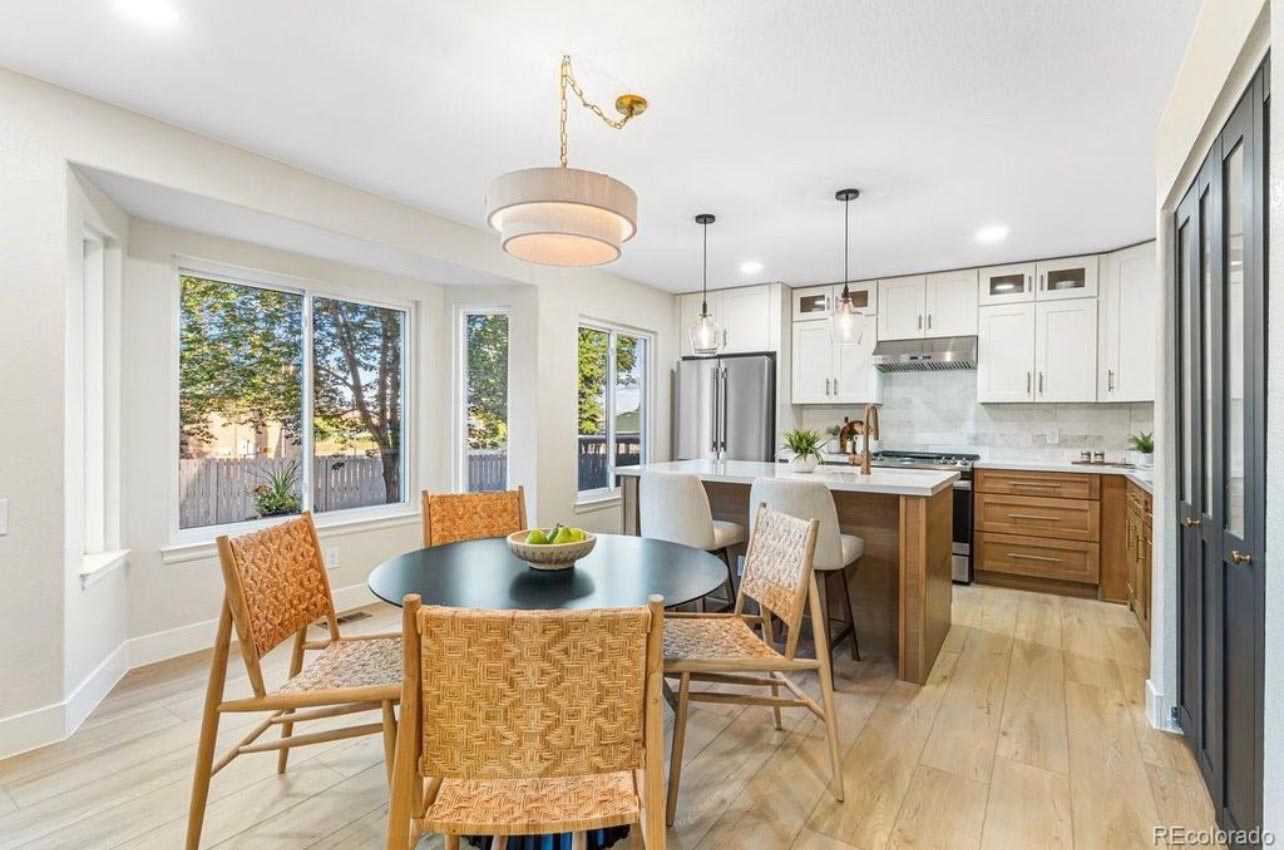 Bright family kitchen and dining nook from a BH Builders Denver-metro remodel
