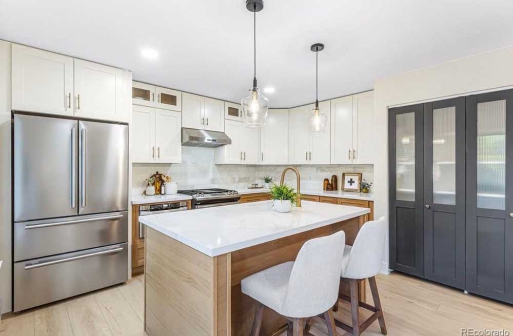 Kitchen remodel white cabinets wood island quartz — kitchen remodel by BH Builders, Denver metro