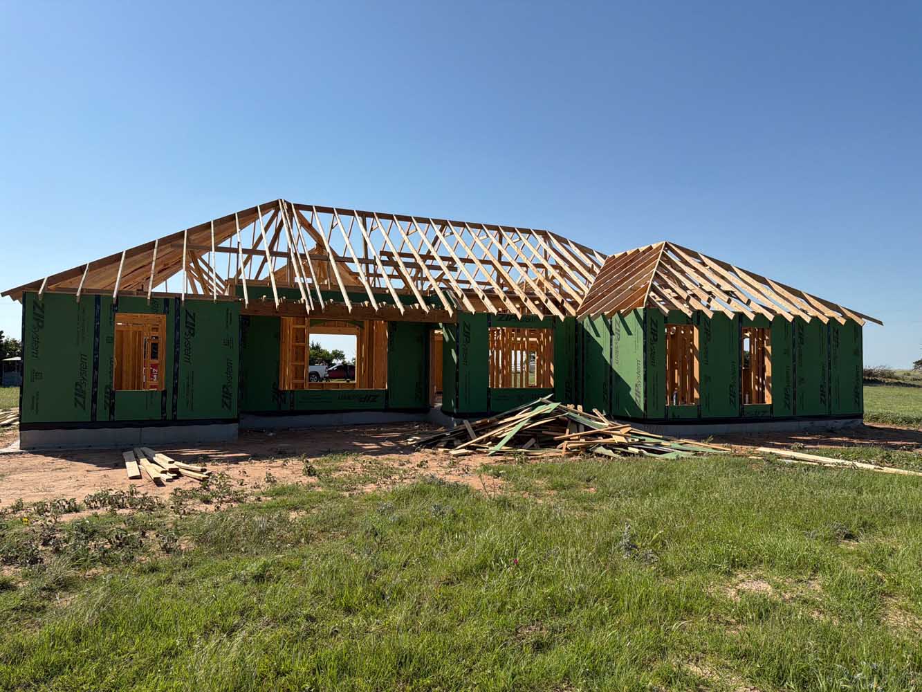Roof Framing & Sheathing Roof framing and sheathing in progress on a new custom home build