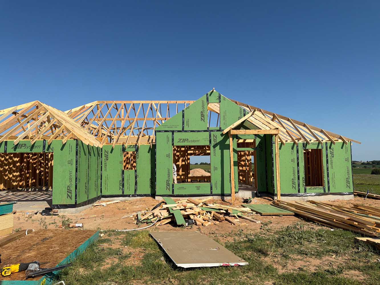 Roof truss framing on a new home showing engineered trusses and bracing