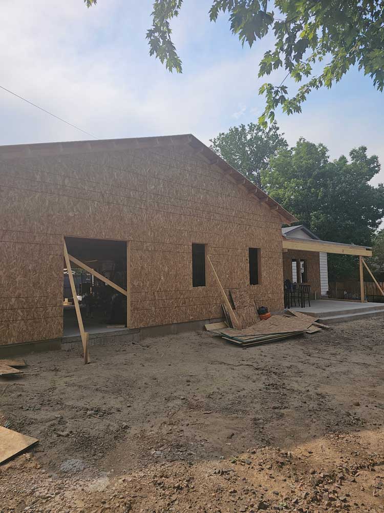 Rear view of a detached garage framed and sheathed on a Denver-metro property