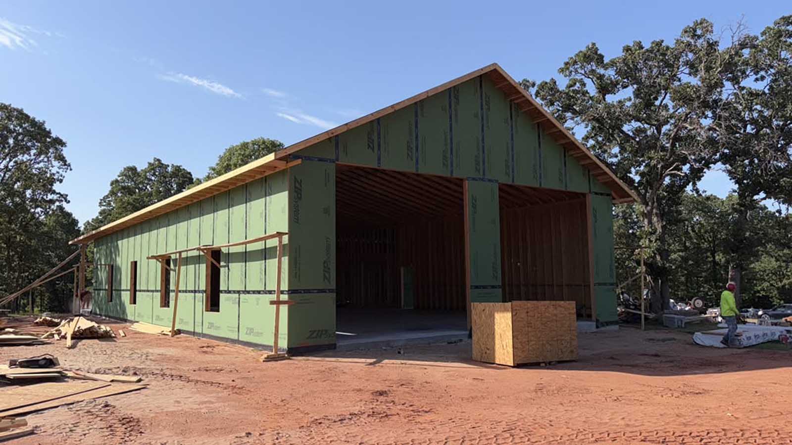 Detached garage workshop framed and sheathed, built for storage and projects